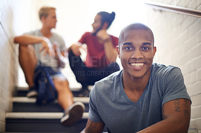 Buy stock photo Black student, friends and happy with portrait on staircase for conversation at recess, break and campus. People, talking and relax on steps in hallway at university between lecture or study class