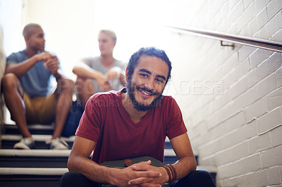 Buy stock photo Student, classmates and happy with portrait on staircase for conversation at recess, break and campus. Diverse people, talking and relax on steps in hallway at university between lecture or class