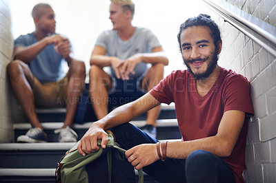 Buy stock photo Portrait, stairs and student with smile, backpack and together with classmates as friends for conversation. University, school and man in course with scholarship, campus and people relax on steps