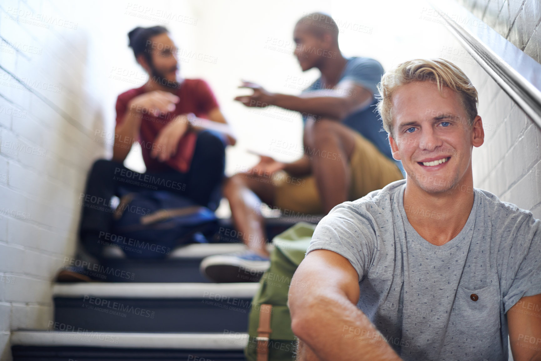 Buy stock photo Student, friends and happy with portrait on steps for conversation at recess, break and campus. Diverse people, talking and relax on staircase in hallway at university between lecture or class