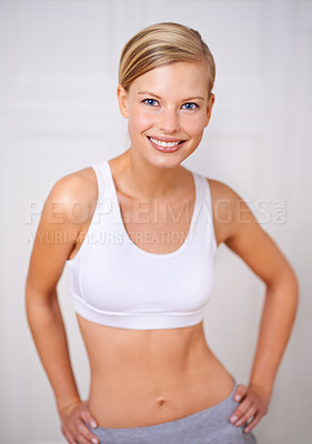 Buy stock photo A portrait of a beautiful young woman in sportswear