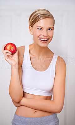 Buy stock photo Happy woman, portrait and diet with apple for nutrition in fitness, health and wellness at home. Face of female person with smile and natural organic red fruit for vitamin, fiber or snack at house
