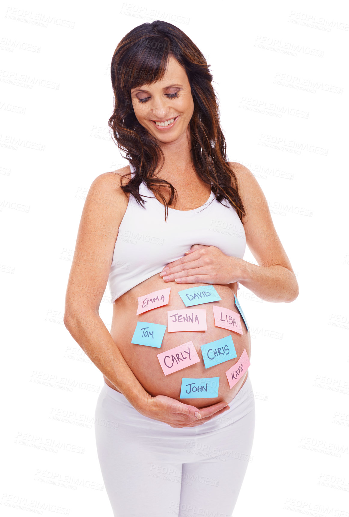 Buy stock photo Smile, names and sticky notes on stomach of pregnant woman in studio isolated on white background. Love, choice or decision and happy young prenatal mother with idea on belly or tummy for maternity