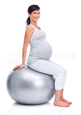 Buy stock photo Maternal woman, ball and studio for portrait trimester, wellness and exercise for motherhood. Pregnant female person, workout and white background for health, fitness and pregnancy to keep in shape 