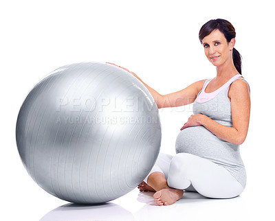 Buy stock photo Pregnant female person, ball and studio for final trimester, wellness and exercise for motherhood. Maternal woman, workout and white background for health, fitness and pregnancy to keep in shape 