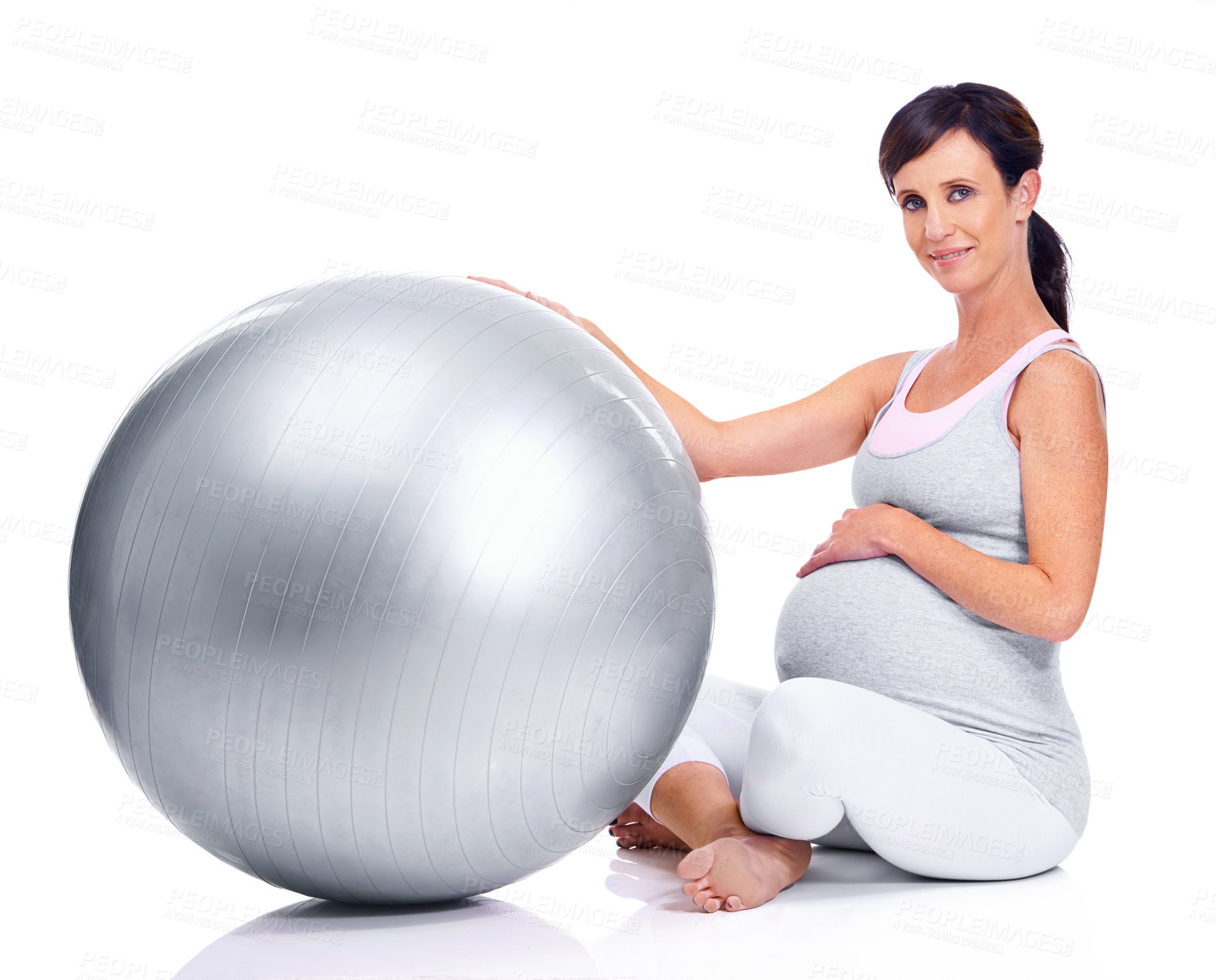 Buy stock photo Pregnant female person, ball and studio for final trimester, wellness and exercise for motherhood. Maternal woman, workout and white background for health, fitness and pregnancy to keep in shape 