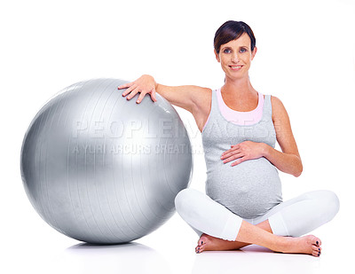 Buy stock photo Pregnant female person, ball and studio for pilates, wellness and exercise for motherhood. Maternal woman, workout and white background for health, fitness and pregnancy to keep in shape and balance