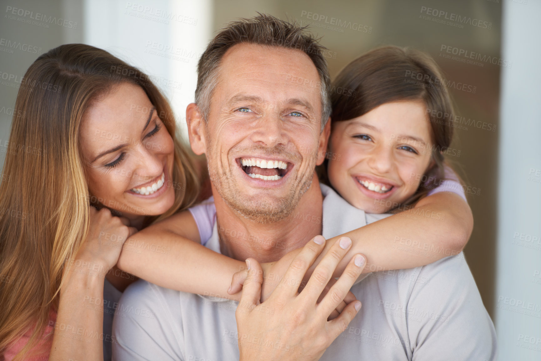 Buy stock photo Mom, dad and girl in portrait in home, relax care and happy bonding together in family house. Mother, father and daughter with smile, love and weekend fun with support for man, woman and child