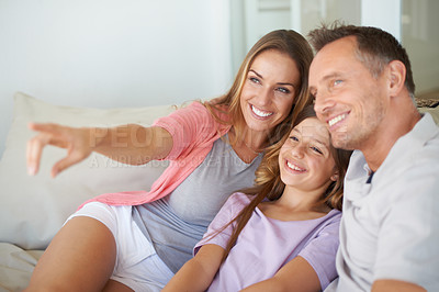 Buy stock photo A beautiful family spending quality time together indoors