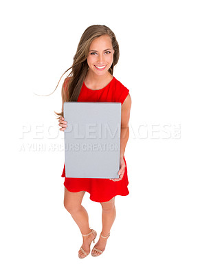 Buy stock photo High angle shot of an attractive young woman posing against a white background