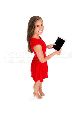 Buy stock photo High angle shot of a woman in a red dress holding a digital tablet