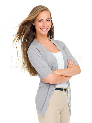 Buy stock photo Portrait, happy for fashion and woman arms crossed in studio isolated on white background with wind in hair. Model, smile and confident young person in casual outfit for trendy or relaxed style