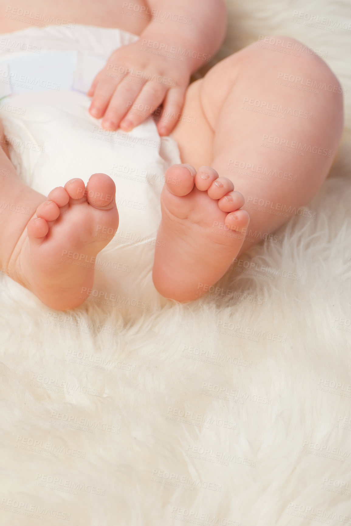 Buy stock photo Baby feet, cute and toes in bedroom, blanket and playtime in diaper for child development in skin care. Infant, kid and wellness for newborn, adorable and rug in house for home and toddler fun