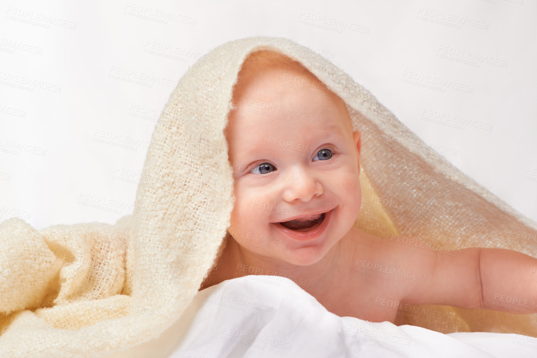 Buy stock photo Baby, smile or towel to play, relax or laugh in nursery at bath time in studio on white background. Happy, young child or blanket for peaceful rest for health, hygiene or childhood development