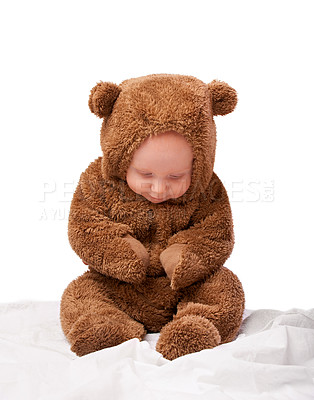 Buy stock photo Growth, development and portrait for baby in studio with bear costume or pajamas against white backdrop. Boy, child or toddler with teddy clothes and adorable and cute for bed, cuddle and cozy 