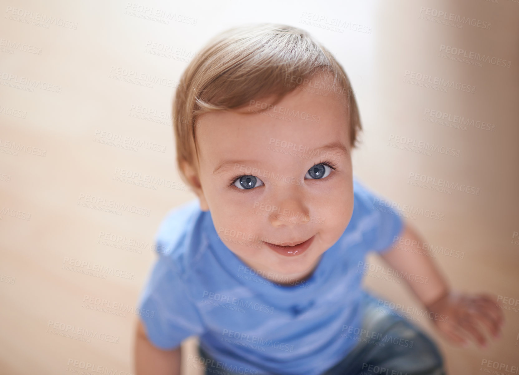 Buy stock photo Toddler, above or portrait of baby in home for fun playing, happiness or learning in living room. Relax, boy or face of a male kid on floor with smile for child development or growth in a house alone