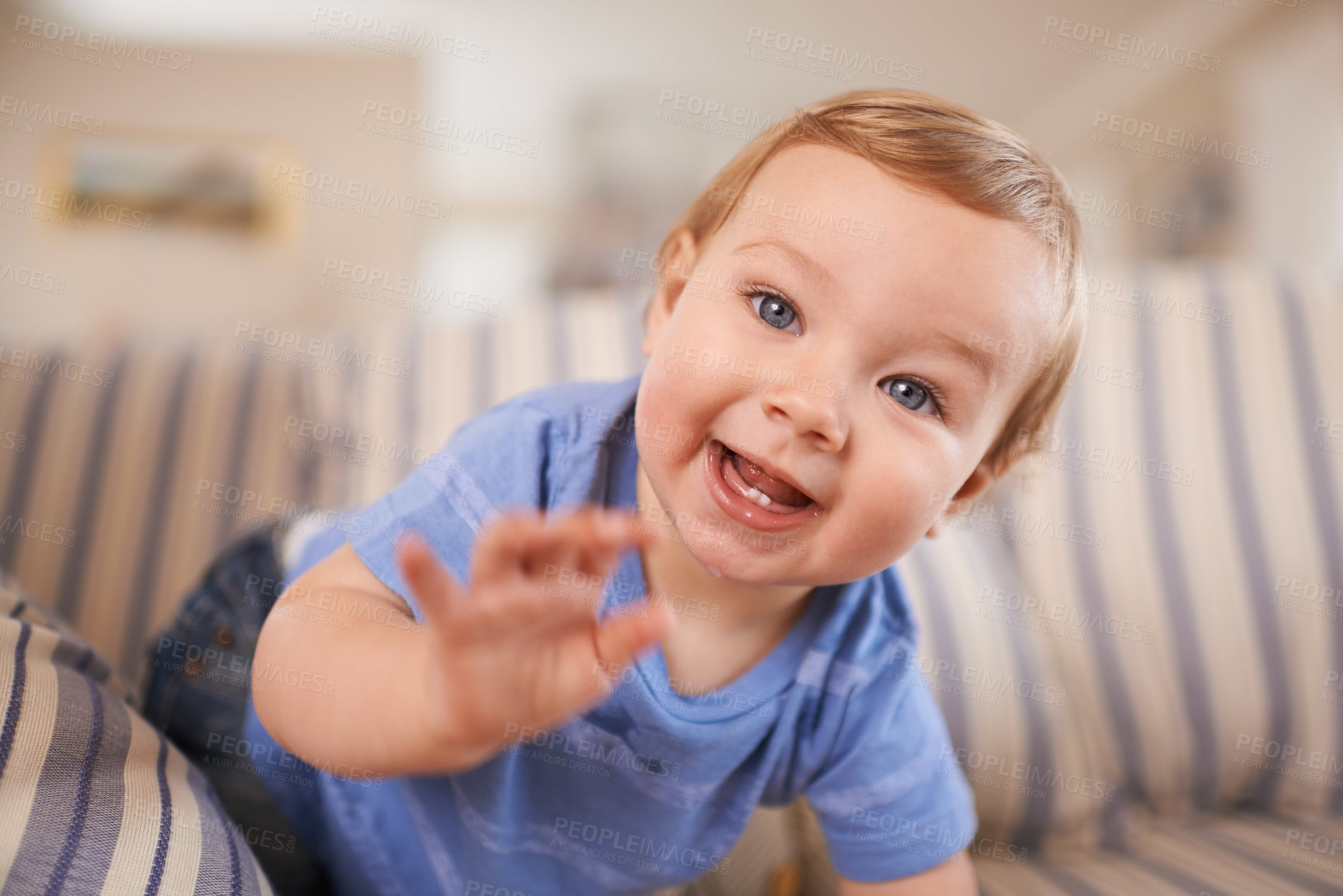 Buy stock photo Playing, playful and portrait of baby in sofa or home for fun, growth or learning alone in living room. Energy, boy or face of a curious male kid on couch for child development or crawling in a house