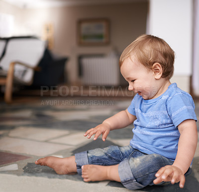 Buy stock photo Growth, development and childhood for toddler in lounge for play and curiosity on floor. Baby, infant or kid at home with smiles and sitting with laugh and happiness for adorable and indoors