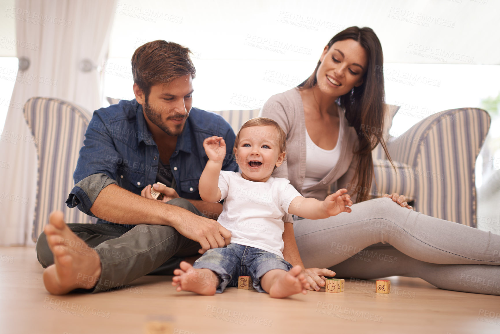 Buy stock photo Parents, baby or building blocks on floor, love or growth or development toys for sensory play in living room. Happy family, kid or interactive game for child or bonding together with care in home