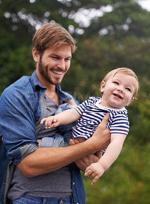 Buy stock photo Playing, smile or father with baby boy in outdoor, love or bonding together for child growth or development. Happy family, dad and fun game with kid in nature and responsibility for care on weekend