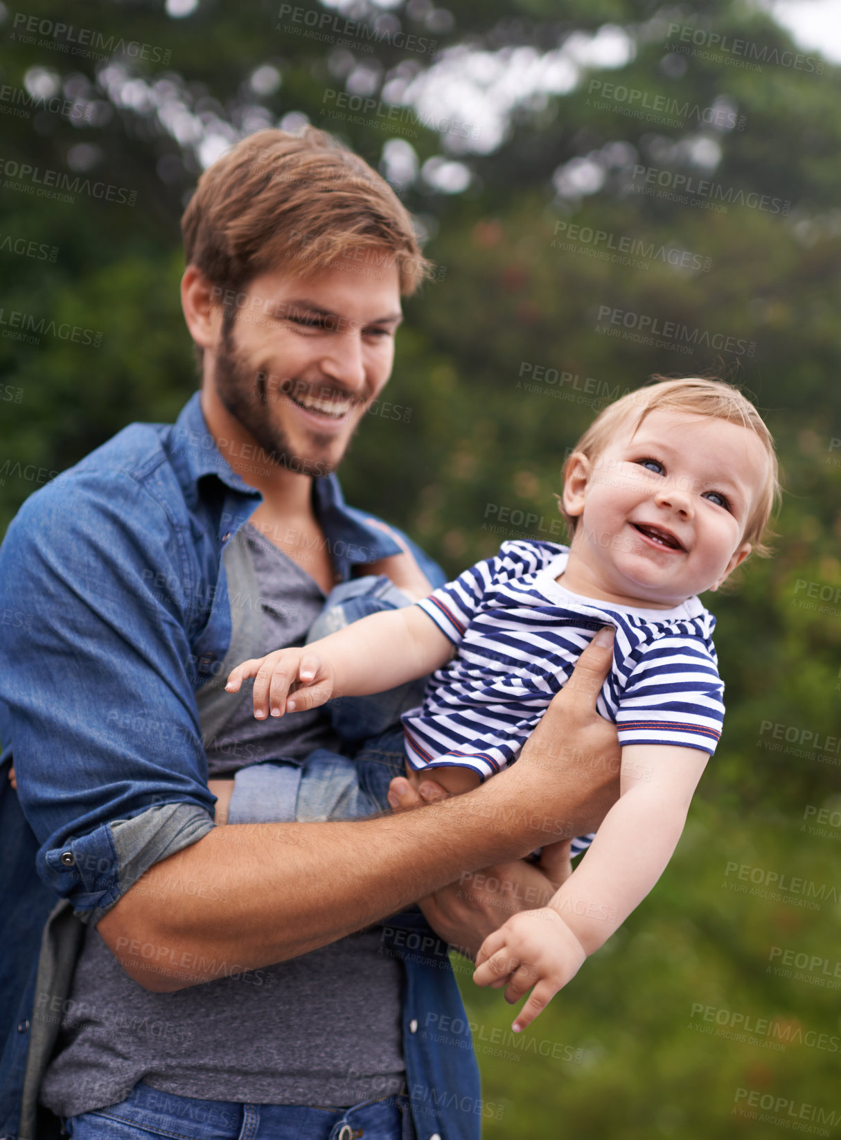 Buy stock photo Playing, smile or father with baby boy in outdoor, love or bonding together for child growth or development. Happy family, dad and fun game with kid in nature and responsibility for care on weekend