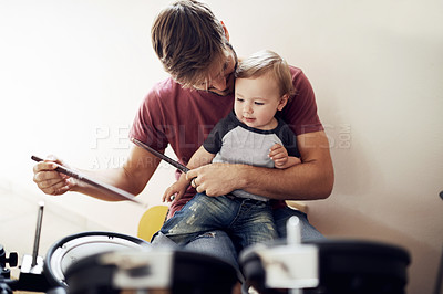 Buy stock photo Father, baby and child drum lesson with music development and learning. Home, dad and papa bonding with youth smile and instrument together with kids teaching, love and parent care at a family house 