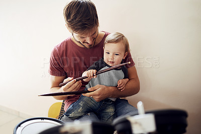 Buy stock photo Happy father, baby and child drum lesson with music development and kids learning. Home, happiness and bonding with youth and dad together with a smile, instrument and parent care at a family house 