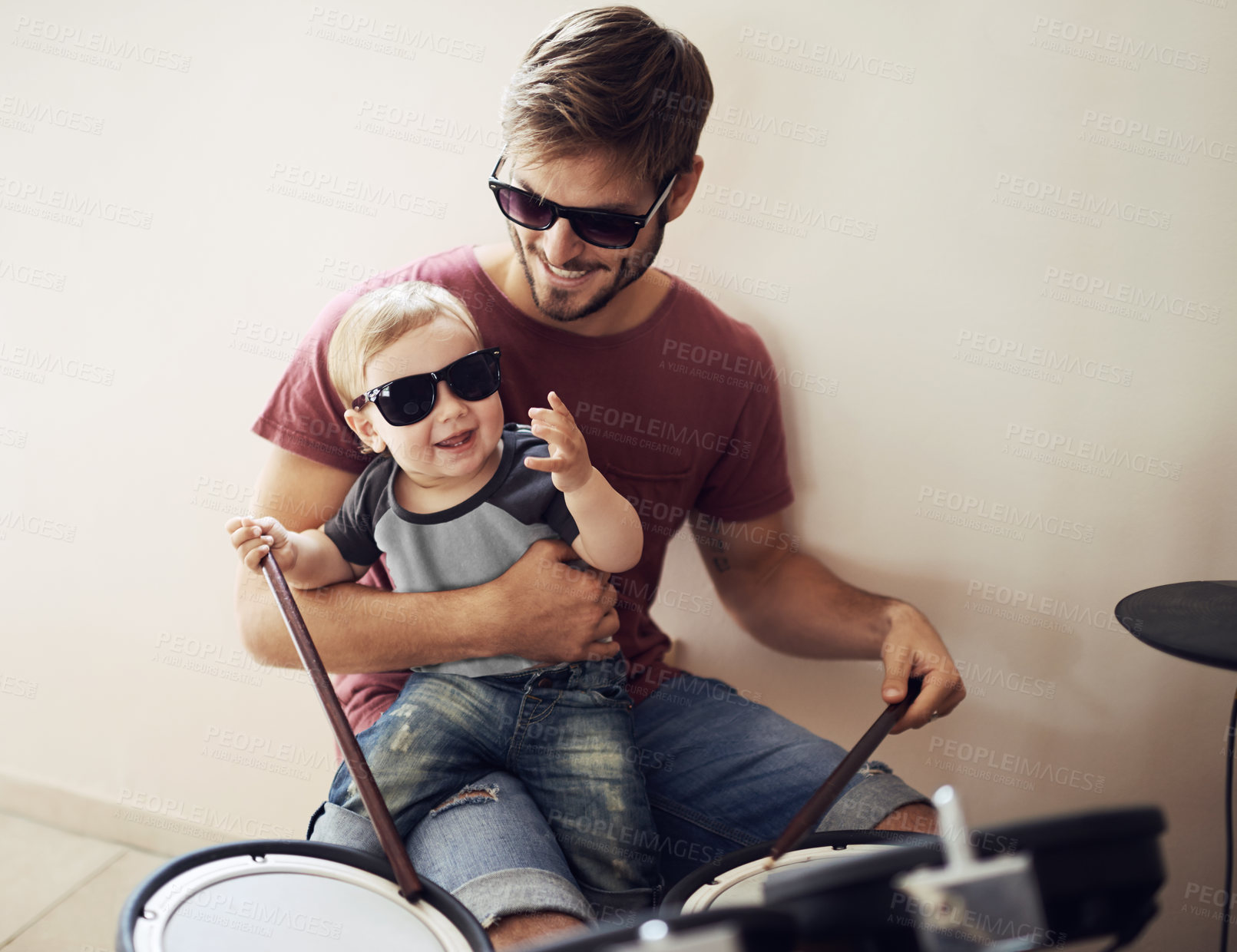 Buy stock photo Father, baby and child drum lesson with music development and learning. Home, happiness and bonding with youth drumming teaching with a smile, love and happy parent care together at a family house 
