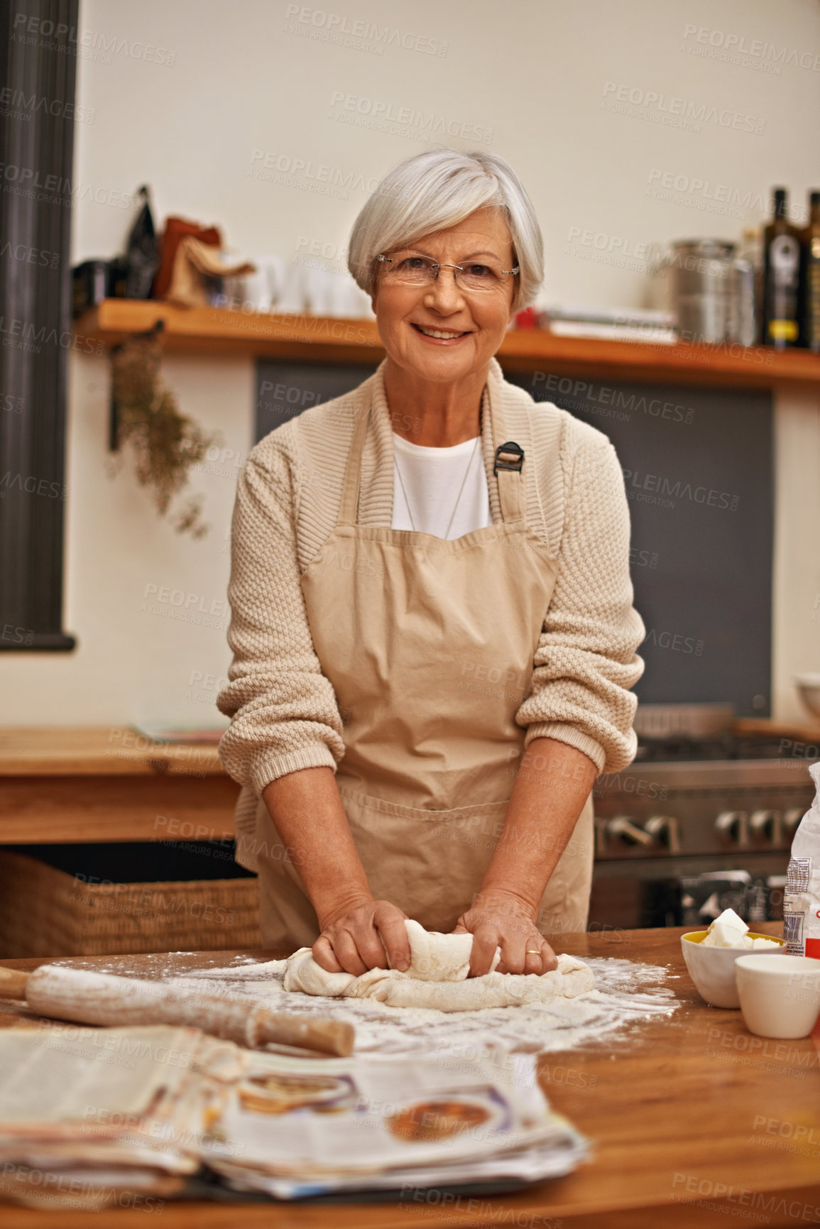 Buy stock photo Senior woman, portrait and dough at home in kitchen for food, nutrition or dessert. Female person, elderly lady and retired cooking pastry dish on table, flour or recipe for eating, dining or dinner
