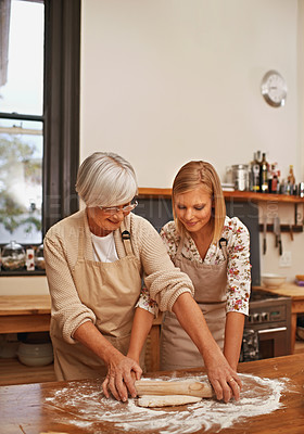 Buy stock photo Family, baking and grandmother in kitchen with ingredients and young lady for teaching and cooking together. Senior citizen or elderly person with apron and smile at home for food or dessert     