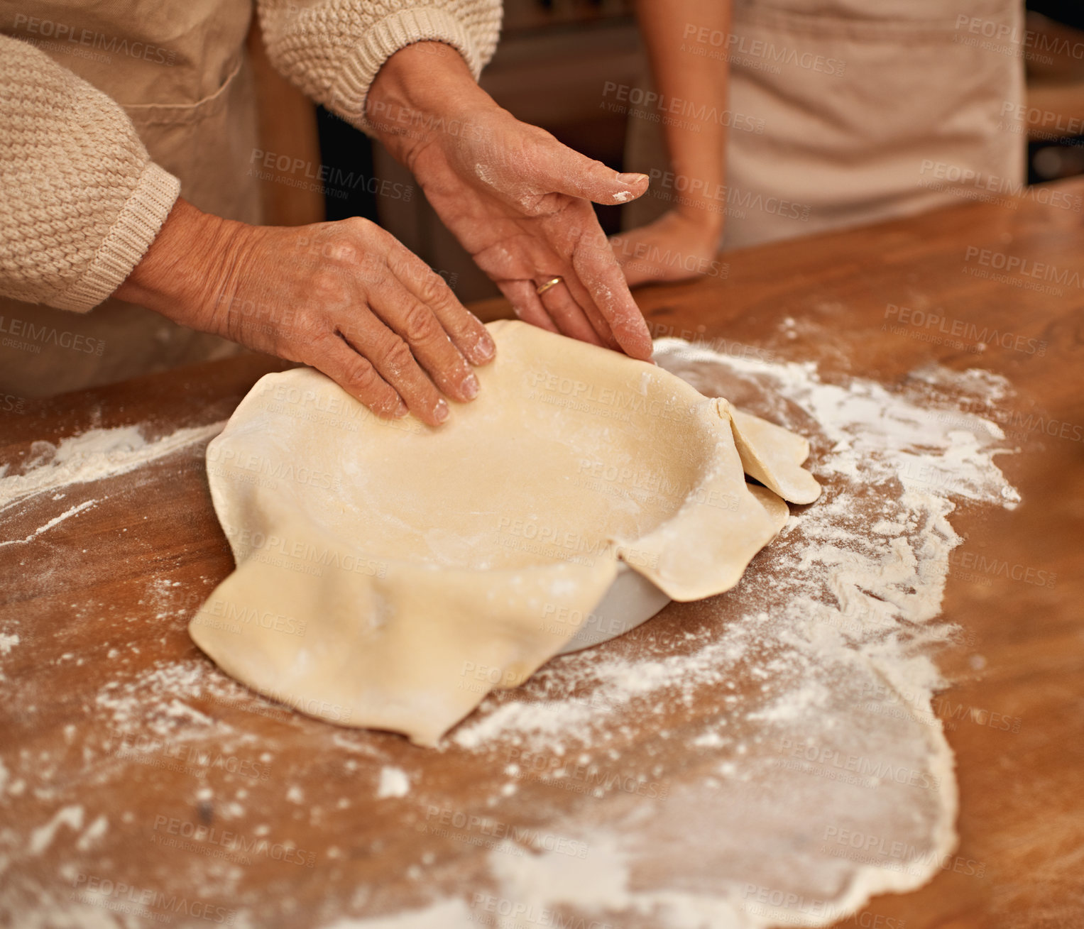 Buy stock photo Hands, flour and people baking in kitchen of home together closeup with ingredients for recipe. Cooking, food or dough with chef and baker in apartment for fresh pastry preparation from above