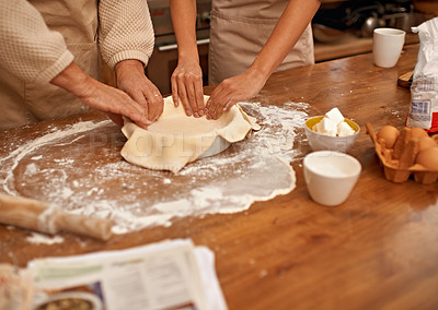 Buy stock photo Hands, food and couple baking in kitchen of home together closeup with ingredients for recipe. Cooking, dough or flour with husband and wife in apartment for fresh pastry preparation from above