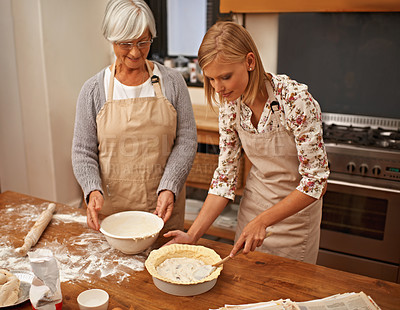 Buy stock photo Baking, food and senior mother with woman in kitchen of home together for pastry preparation. Cake, dough or flower with parent and daughter in apartment, cooking food ingredients for bonding