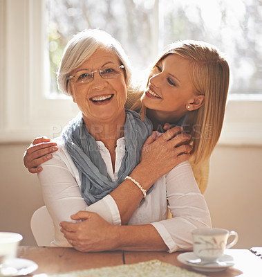 Buy stock photo Grandmother, grandchild and happiness for bonding in portrait at nursing home with tea and conversation with love. Grandma, woman and together with affection or care, family and embrace with hug