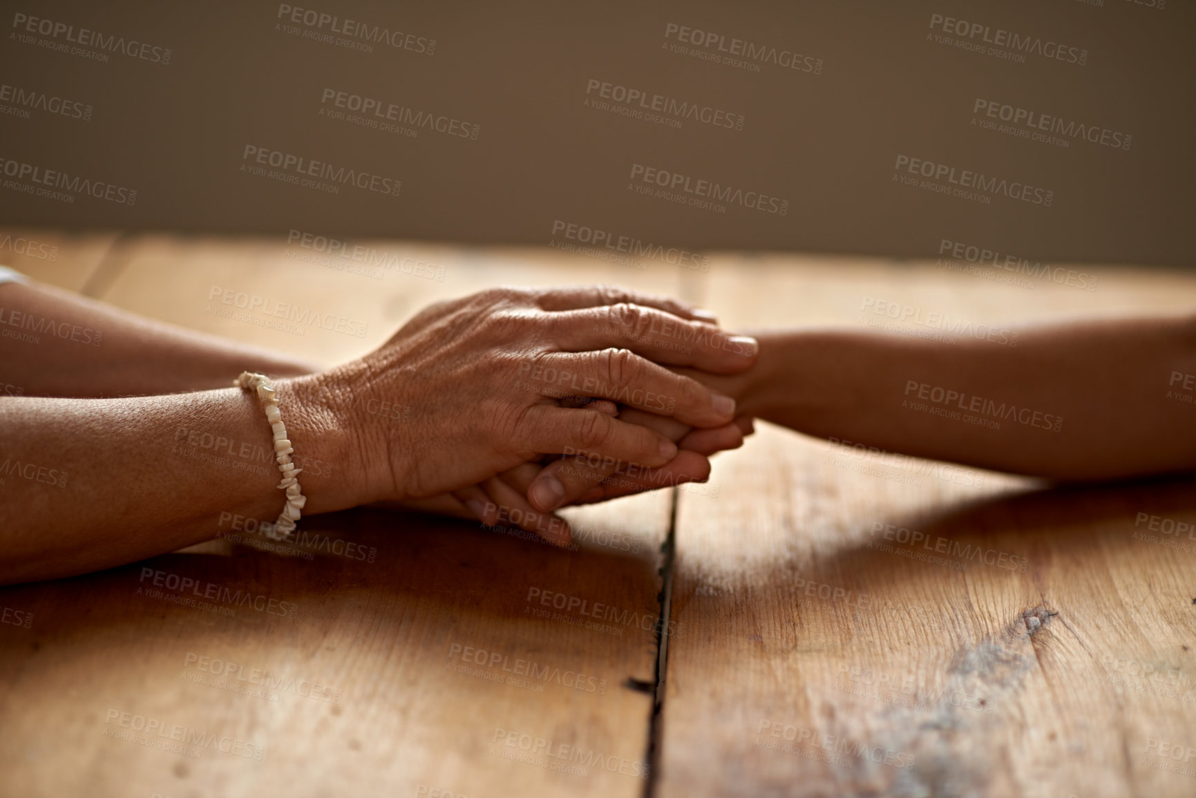 Buy stock photo Love, friendship and people holding hands for unity, grief and sympathy after loss or counselling. Gratitude, empathy and friends having intimate moment with affection for hope, trust and solidarity.