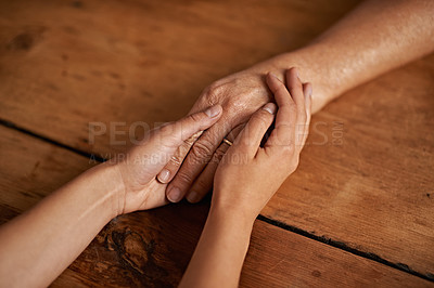 Buy stock photo Closeup, people and hands with empathy or support for grief, comfort and compassion by table in home. Sympathy, family and praying together for gratitude, healing and kindness with trust and care