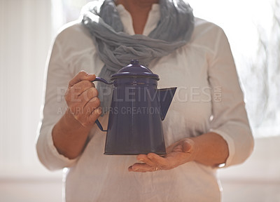 Buy stock photo Hands, teapot and window with closeup, kitchen and retirement with gratitude and relaxing. Mature person, kettle and hold with drink, home and coffee or tea for routine and break in family house