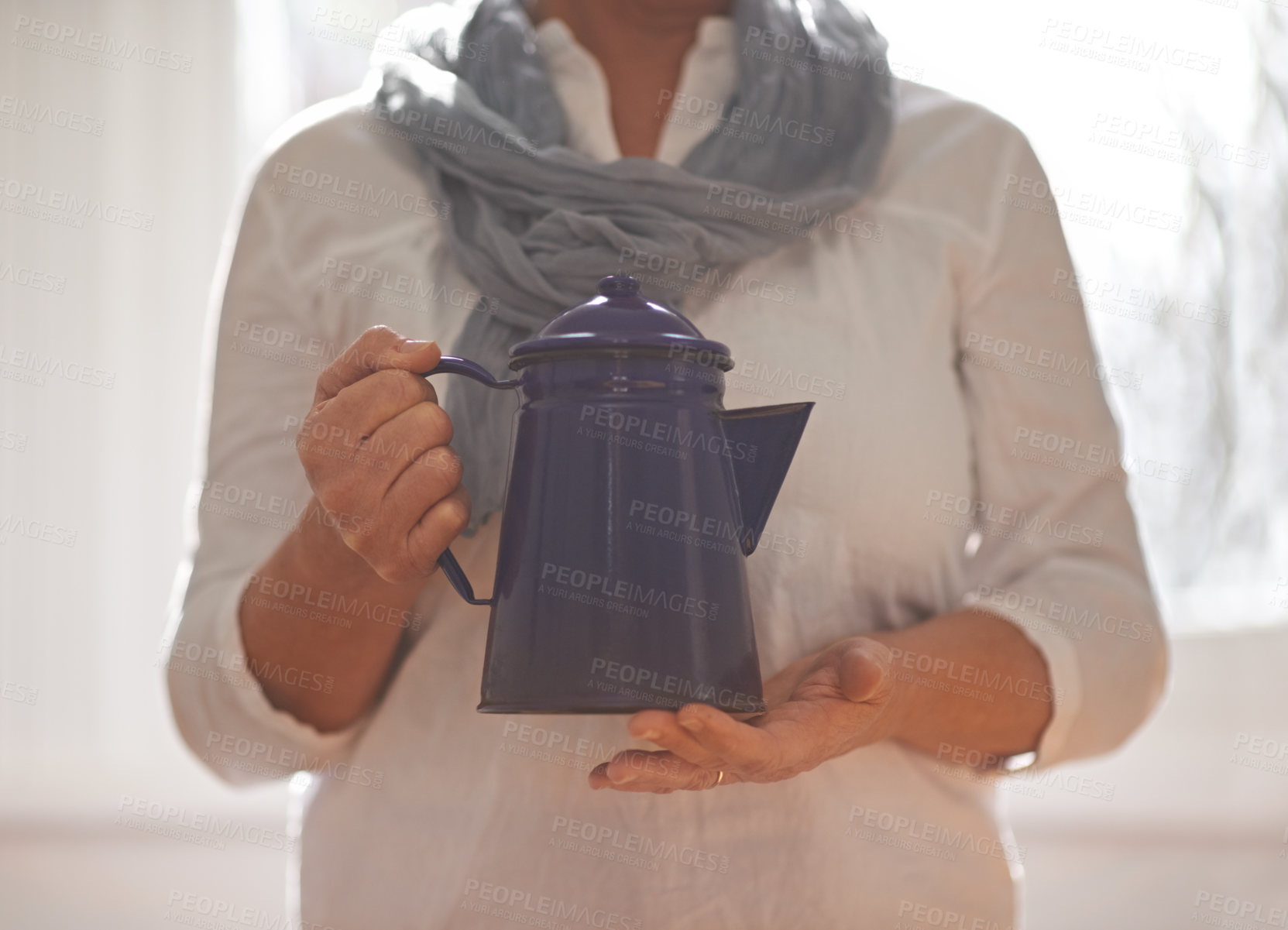 Buy stock photo Hands, teapot and window with closeup, kitchen and retirement with gratitude and relaxing. Mature person, kettle and hold with drink, home and coffee or tea for routine and break in family house