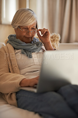 Buy stock photo Senior woman, laptop and internet for website in home, retirement planning and glasses for reading. Elderly female person, online and networking or browse on blog, relax and pension for investment