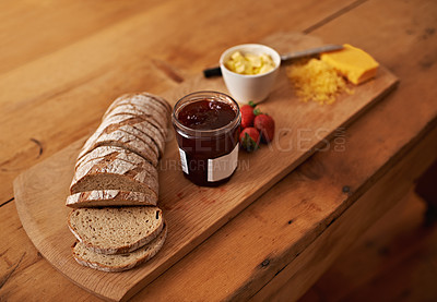 Buy stock photo Breakfast, charcuterie and cheese with jam, bread and fresh strawberry for diet, nutrition and gourmet morning snack. Food, fruit and high angle of sweet, savory and delicious rustic brunch on board.