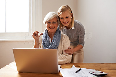 Buy stock photo Woman, senior mother and laptop for finance in home, support and help for ecommerce on website. Daughter, old person and paperwork for tax return, investment and teaching on tech for online banking