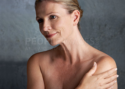 Buy stock photo Studio shot of a mature woman with beautiful skin