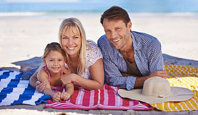 Buy stock photo Portrait, smile and beach with family, holiday and summer with weekend break and getaway trip. Face, parents and mother with father or daughter with vacation and seaside with ocean or tropical island