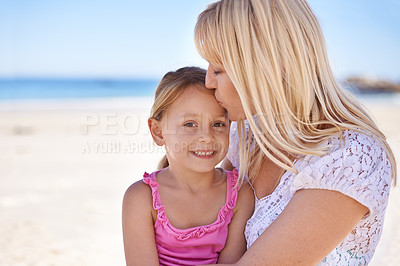 Buy stock photo Portrait, mother and kiss happy kid at beach for holiday, summer or love on vacation at sea. Face, mom and smile of girl at ocean for adventure, travel or family bonding together outdoor in nature