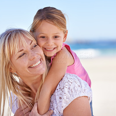 Buy stock photo Child, mother and happy kid on beach for holiday, summer or vacation with piggyback at sea. Face, mom and smile of girl at ocean for adventure, travel or family bonding together outdoor in nature