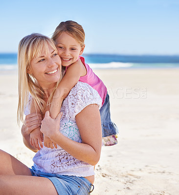 Buy stock photo Piggyback, mother and happy kid on beach for holiday, summer or vacation on mockup space. Sea, smile and mom carrying girl child at ocean for adventure, travel or family bonding together outdoor