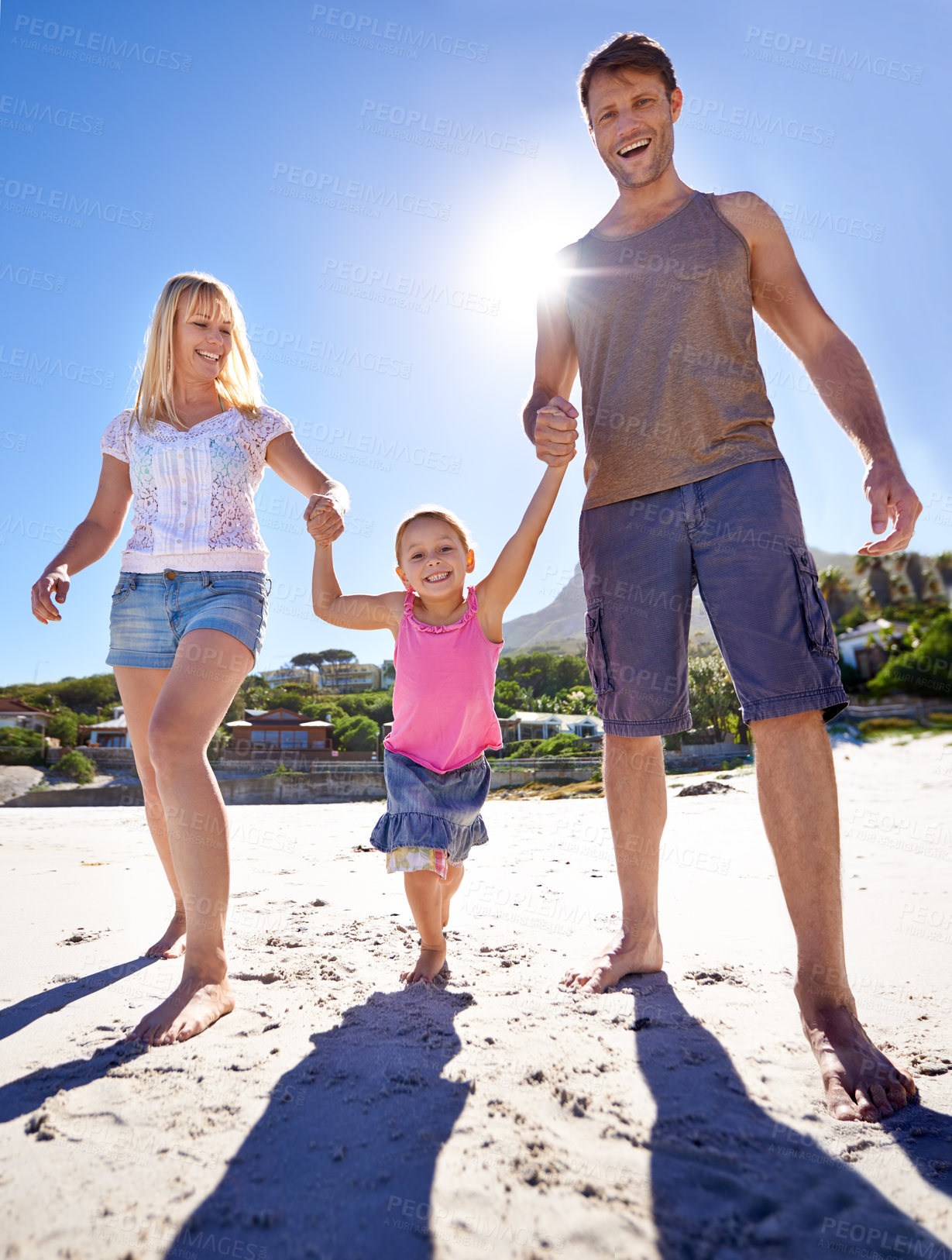 Buy stock photo Family, child and smile on beach with walk for sunshine, holiday and summer vacation in Costa Rica. Nature, parents and holding hands with daughter for happiness, travel and seaside fun on sand