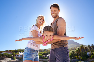 Buy stock photo Love, airplane and parents lifting child at a beach for travel, fun or bonding in nature together. Freedom, support and family at sea for morning games, playing or flying adventure in South Africa