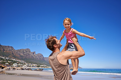 Buy stock photo Love, airplane and father lifting child at a beach for travel, fun or bonding in nature together. Freedom, support and dad embrace girl at sea for morning games, playing or adventure in South Africa