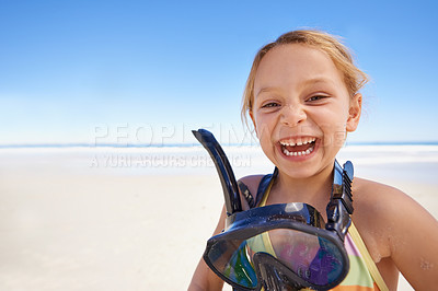 Buy stock photo Girl, portrait and goggles for swimming at beach, laughing and equipment for snorkeling on holiday. Female person, child and happy on tropical vacation in outdoors, sand and blue sky for mockup space